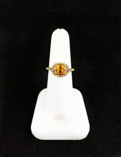Ring by Carleo Creations Inc - Orange/Gold Oval